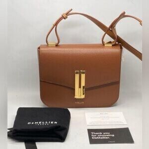 A delicate and compact small handbag